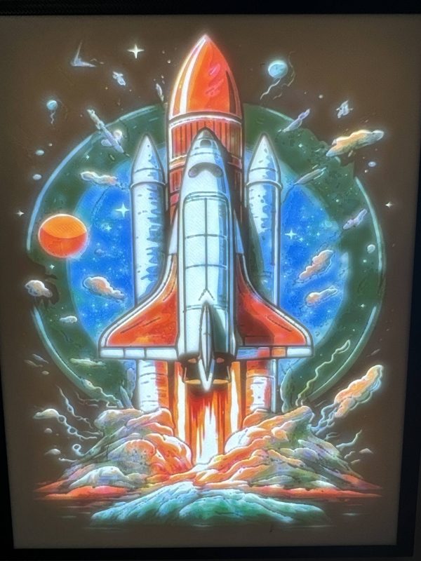 Colorful backlit artwork of a space shuttle launching, surrounded by stars and planets.