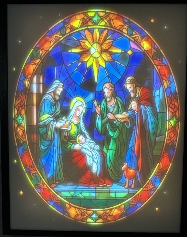 Stained glass-style depiction of a Nativity scene with the Three Wise Men presenting gifts.