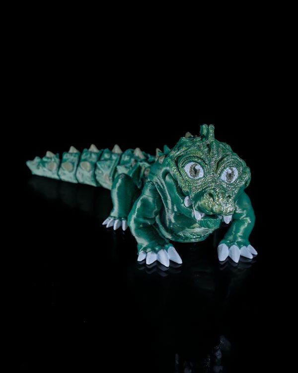 Articulated Alligator - Custom - 3D Printed Figure with detailed scales and movable joints displayed against a black background.